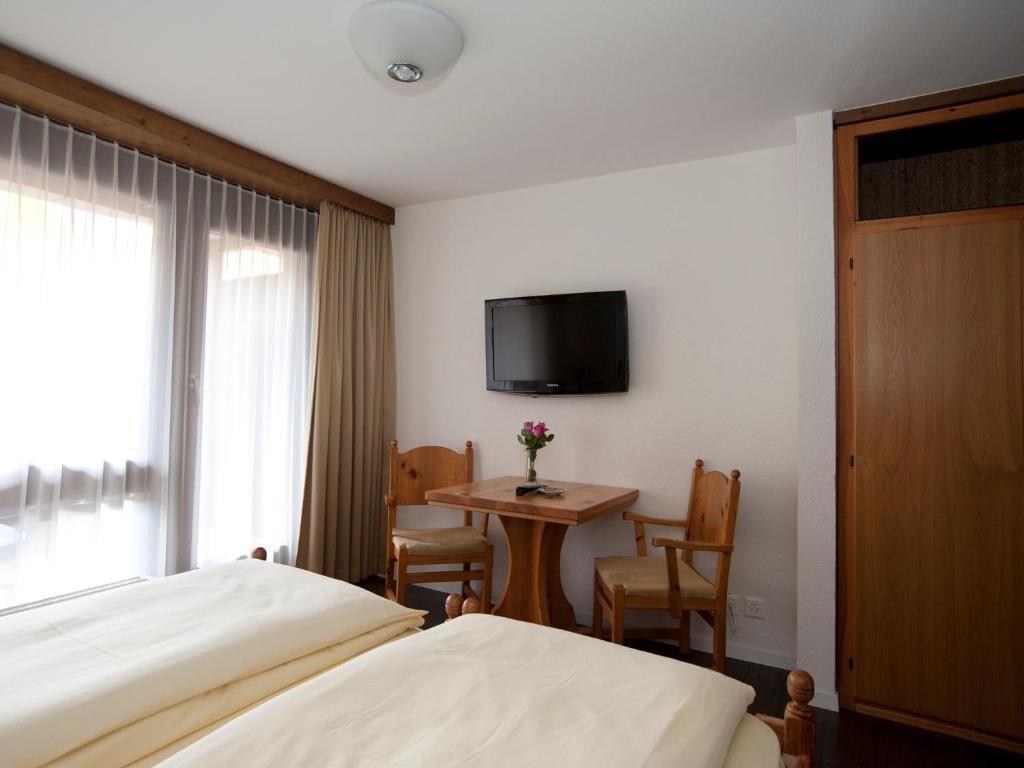Ambiente Guesthouse Saas-Fee Habitación foto